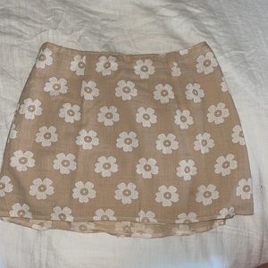 Princess Polly cream/beige with white floral mini skirt, size 6